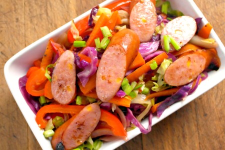 Beer Braised Sausage On Sweet & Spicy Warm Slaw